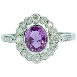 Vintage - Art deco style 0.78 carat pink sapphire cluster ring in diamond halo surround, gold