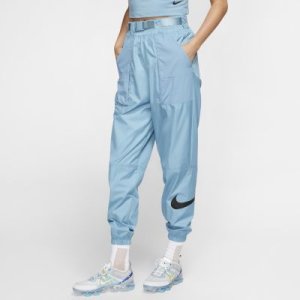 Damskie spodnie z tkaniny z logo Swoosh Nike Sportswear - Niebieski
