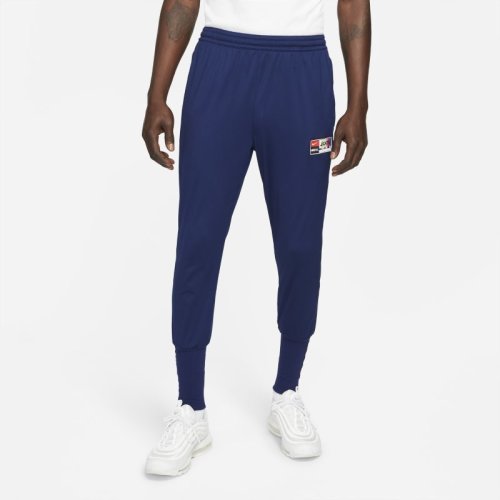 Męskie spodnie piłkarskie ze ściągaczami Nike F.C. - Niebieski