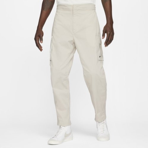 Męskie spodnie utility z tkaniny bez podszewki Nike Sportswear Style Essentials - Brązowy