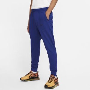Męskie spodnie z dzianiny Nike Sportswear Tech Pack - Niebieski