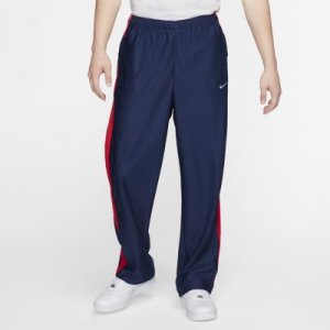 Spodnie męskie w paski z logo Swoosh Nike - Niebieski