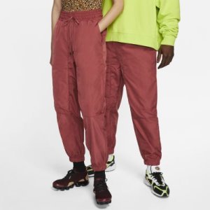 Spodnie z tkaniny Nike Sportswear City Ready - Czerwony