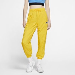 Spodnie z tkaniny z logo Swoosh Nike Sportswear - Złoto