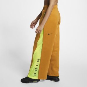 Byxorna Nike Sportswear Tech Pack för kvinnor - Brun