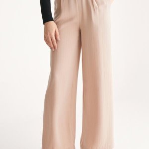 Palazzo trousers with subtle stripes and waist piping in blush