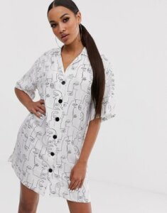 ASOS DESIGN chuck on mini shirt dress in abstract face print-Multi