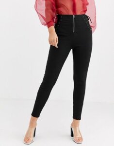 ASOS DESIGN corset lace up skinny pants with contrast stitch detail-Black