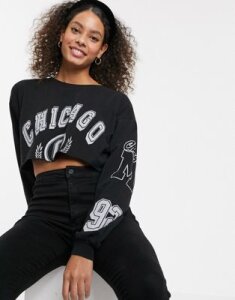 ASOS DESIGN cropped t-shirt with long sleeve with varsity badges-Black