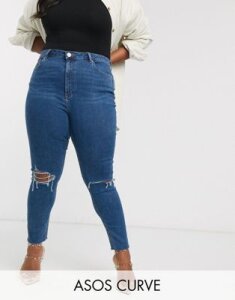 ASOS DESIGN Curve Ridley high waist skinny jeans in bright midwash blue with rips and raw hem