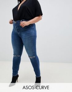 ASOS DESIGN Curve Ridley high waisted skinny jeans in extreme dark stonewash with button fly and ripped knee-Blue