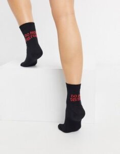 ASOS DESIGN do not disturb slogan ankle sock in black