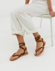ASOS DESIGN Fix It leather flat sandals in leopard print-Brown