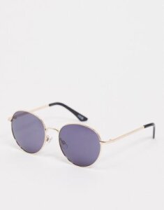 ASOS DESIGN large metal round sunglasses in black and gold frame