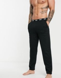 ASOS DESIGN lounge pyjama bottom in black with branded waistband