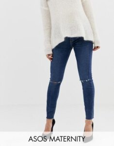 ASOS DESIGN Maternity Ridley high waisted skinny jeans in dark wash blue with ripped knee detail with under the bump wai