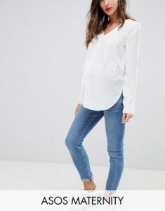 ASOS DESIGN Maternity Ridley high waisted skinny jeans in pretty mid stonewash blue with under the bump waistband