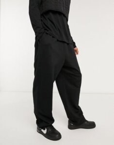 ASOS DESIGN organic super oversized sweatpants in black with toggle hem