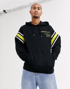 ASOS DESIGN oversized hoodie in black with wash and print detail