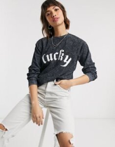 ASOS DESIGN oversized t-shirt in wash with long sleeve with lucky print-Black
