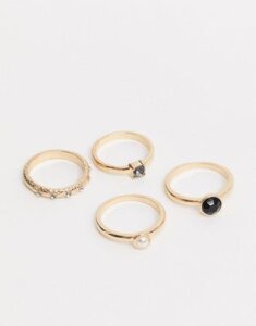 ASOS DESIGN pack of 4 rings with faux black stone and pearl in gold tone
