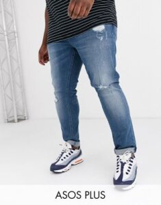 ASOS DESIGN Plus skinny jeans in mid wash blue with rips and destroy