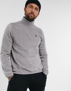 ASOS DESIGN polar fleece sweatshirt with half zip & triangle print in gray