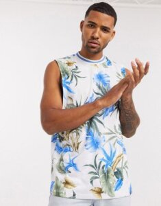 ASOS DESIGN relaxed dropped armhole sleeveless t-shirt with all over floral print and tipped neck rib-White