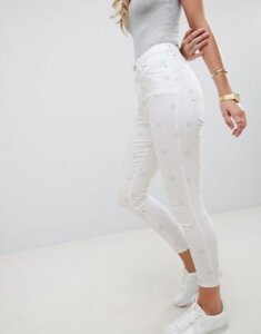 ASOS DESIGN Ridley high waist skinny jeans with mint polka dot print-White