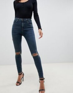 ASOS DESIGN Ridley high waisted skinny jeans in london wash blue with rips