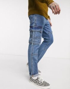 ASOS DESIGN rigid slim jeans with utilty pockets in mid wash blue