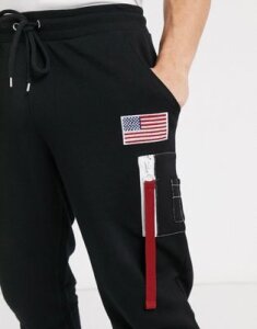 ASOS DESIGN slim sweatpants in black with MA1 pocket & badge detail