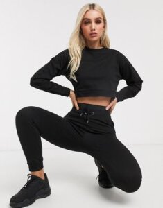 ASOS DESIGN tracksuit sweat / jogger with cut out elastic waist-Black