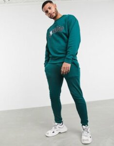ASOS DESIGN tracksuit with oversized sweatshirt and skinny sweatpants with Chicago print-Green