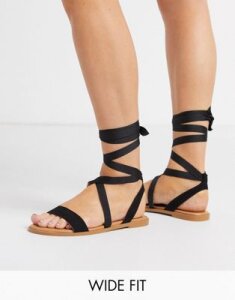 ASOS DESIGN Wide Fit Finland tie leg flat sandals in black