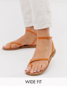 ASOS DESIGN Wide Fit Freefall minimal toe loop flat sandals in orange