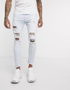 Bershka Join Life super skinny jeans with rips in light blue