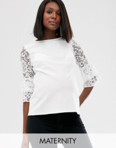 Blume Maternity exclusive lace sleeve top in white