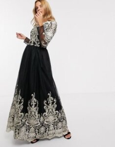 Chi Chi London premium lace maxi dress in black and gold
