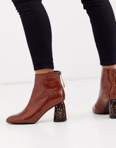 Glamorous brown patent boots with leopard heel