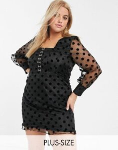 In The Style Plus mesh polka dot frill hem mini dress in black