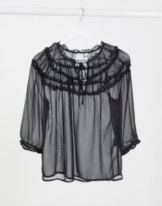 JDY sheer top with ruffle detail in black