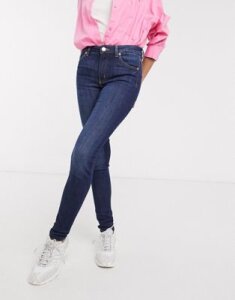 Monki Mocki mid waist slim jeans with organic cotton in mid blue