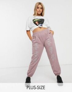 New Girl Order Curve relaxed sweatpants with glitter roses in washed pink