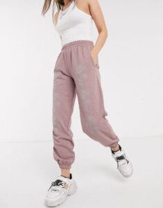 New Girl Order relaxed sweatpants with glitter roses in washed pink