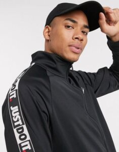 Nike Just Do It zip-through polyknit taping track jacket in black
