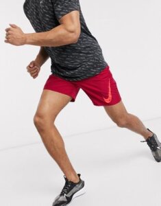 Nike Running Challenger shorts in red