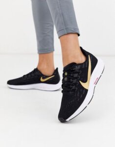 Nike Running pegagus 36 sneakers in black with gold swoosh