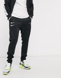 Nike Swoosh polyknit sweatpants in black