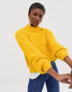Pieces knitted yellow sweater